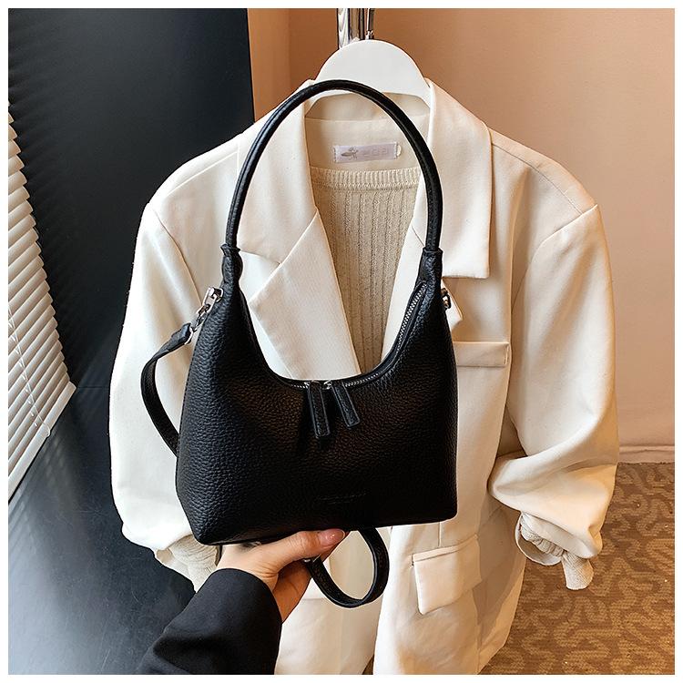 High-end niche bag women's new fashion simple messenger bag versatile shoulder armpit bag