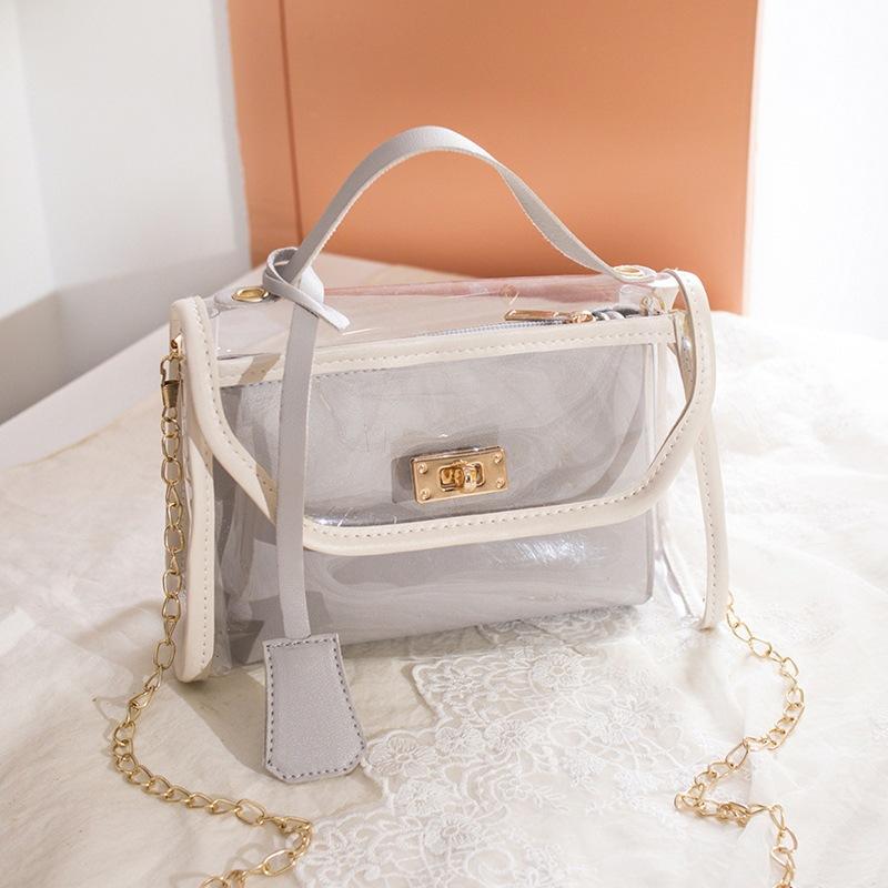 

A women s bag, a new spring and summer fashionable transparent jelly mother bag, a shoulder mobile phone change bag. серый