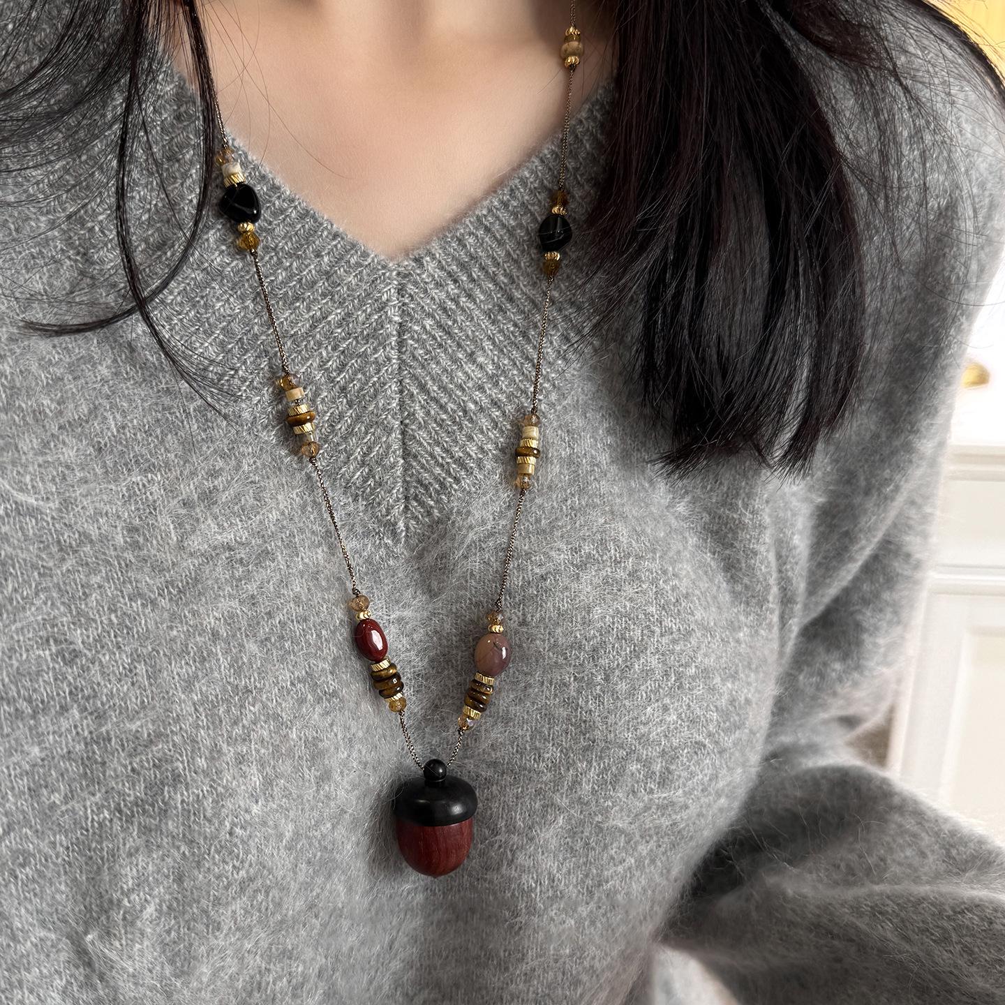 Hazelnut Pendant Necklace: Ethnic Style Retro Wood Sweater Chain, High-End Versatile Accessory for Women.