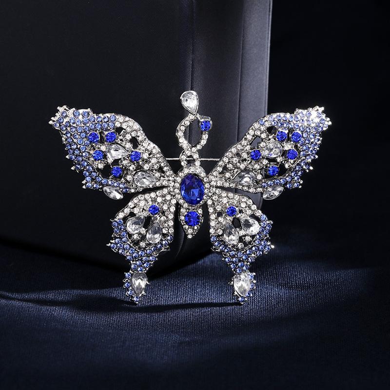 New light luxury high-end colored diamond butterfly brooch women s high-end sense versatile exquisite hollow insect brooch