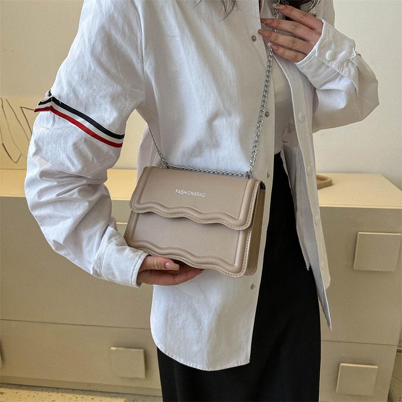 Korean Style Small Square Women's Crossbody Bag - 2025 Solid Color, Wave Pattern, Chain Shoulder, Simple Fashion.