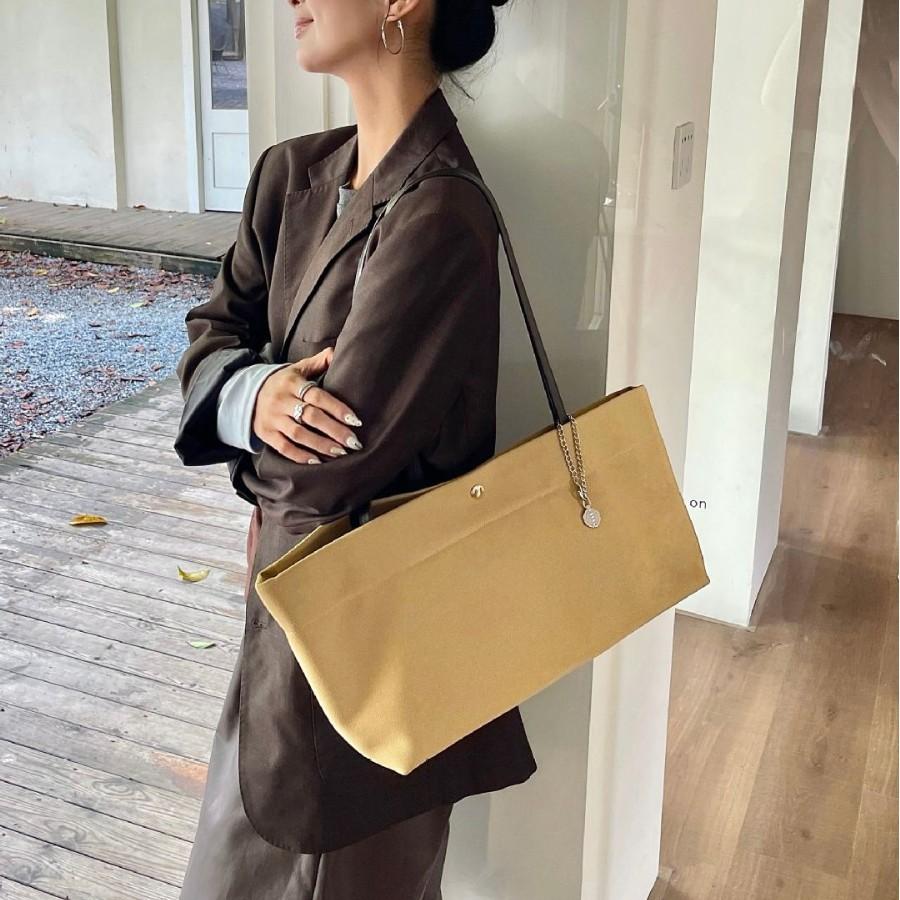 Fashion and casual large-capacity portable women's bags, niche single shoulder armpit bags, high-end cowhide canvas tote bags