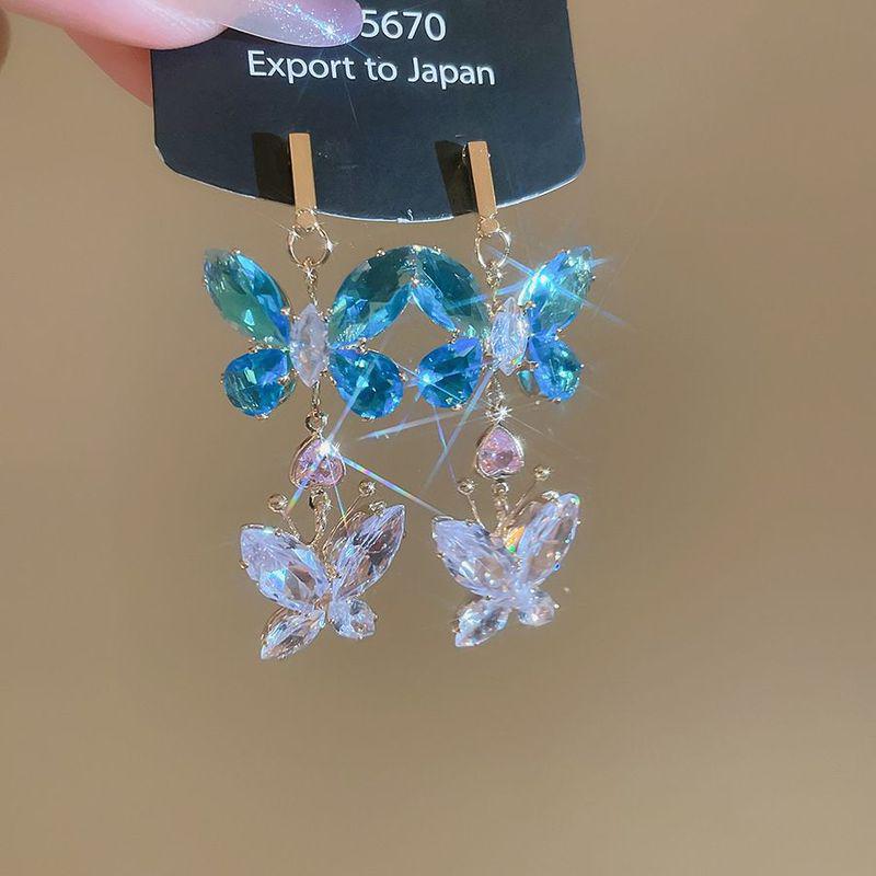 Silbernadel Zirkon Schlangenherz Ohrringe: Elegante, Einzigartige High-End Ohrstecker für Damen