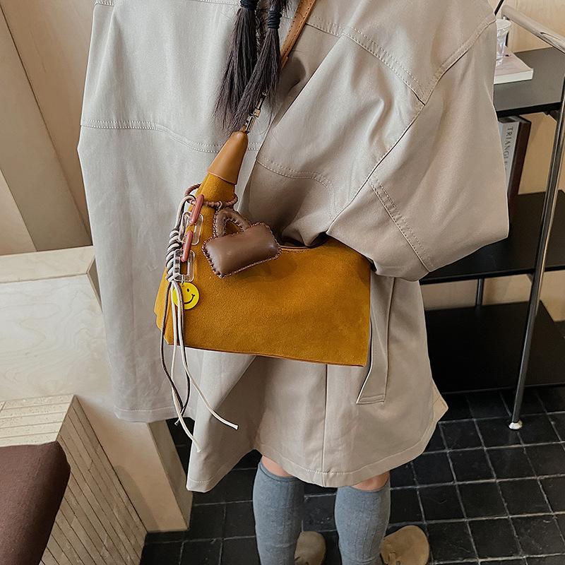 Hand Carry Fashion Dumpling Bag Women 2025 Autumn and Winter Korean Ins Simple Versatile Shoulder Bag Niche Trend Messenger Bag