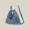 Niche Women's Versatile Denim Tote: Large Capacity, Multi-Use, Crossbody Bag for Daily Style.