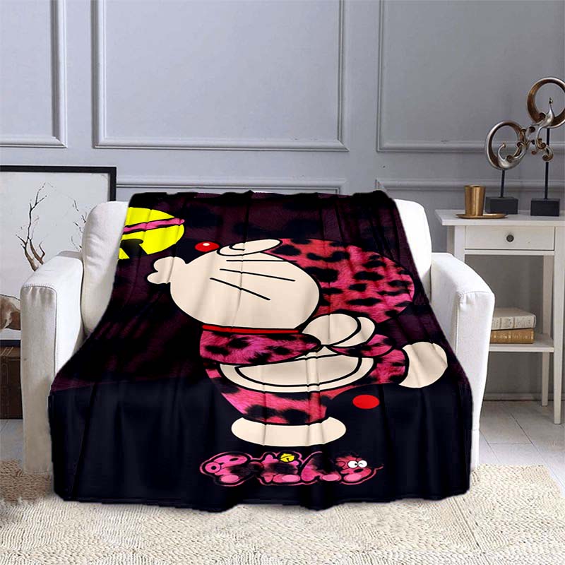 

This 3D printed Doraemon cartoon blanket is a warm and comfortable flannel blanket suitable for bedrooms, sofas, beds, chairs, 75x90cm