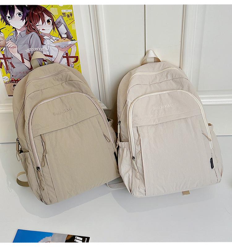 Rucksack mit großem Fassungsvermögen und einfarbig für Studentinnen, leichte Laptop- und Campustasche im japanischen und koreanischen Stil