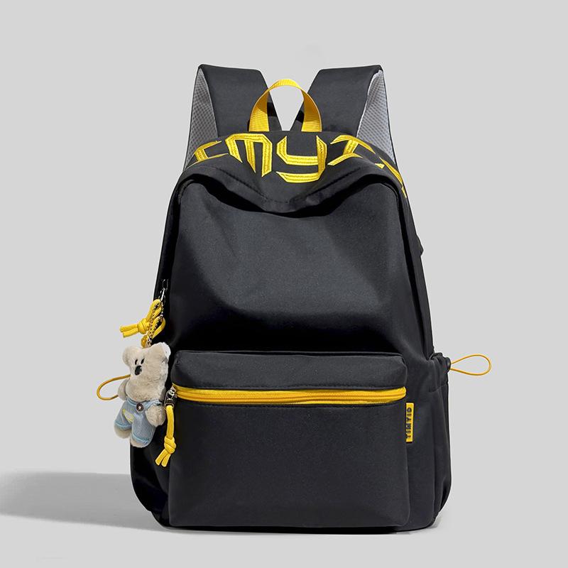 Schoolbag Japanese simple and versatile large-capacity solid color campus schoolbag 1011 summer new light commuter student backpack