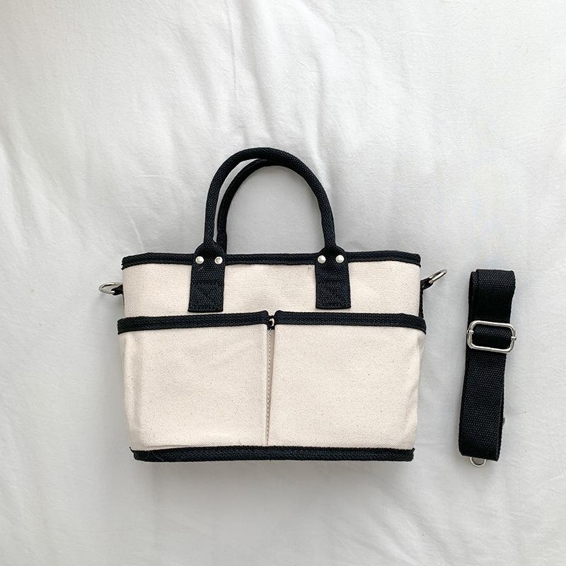 

Casual hand-held canvas bag literary niche large-capacity tote bag women s high-end single shoulder messenger bag women