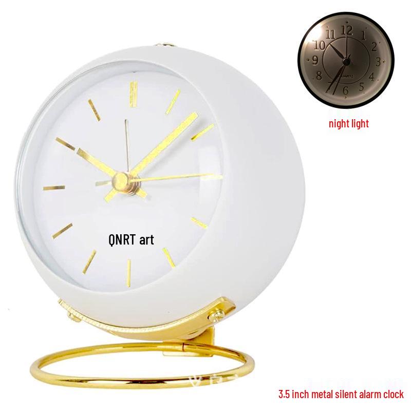 Silent Metal Alarm Clock with Night Light and Gold Stamped Spherical Face - Perfect for Students and Children.