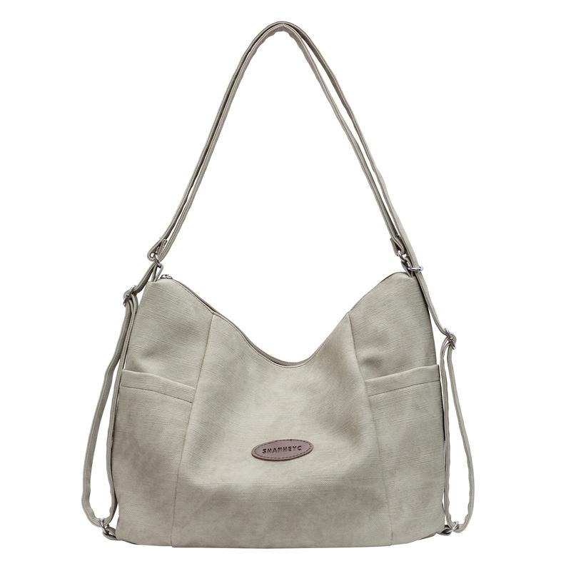 

Рюкзак 2025 Однотонный Большой вместимости Сумка-тоут для поездок на работу На плечо Премиальная женская сумка зелёный