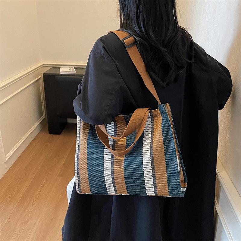 Korean version of canvas shoulder bag 2025 autumn and winter new literary stripes large-capacity student tote bag fashion shopping bag