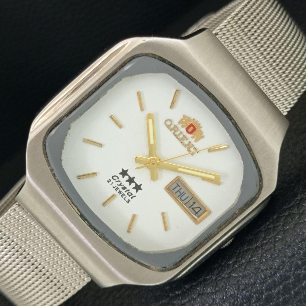 

VINTAGE ORIENT CRYSTAL AUTOMATIC 46941 JAPAN MENS WHITE DIAL WATCH a704871-1