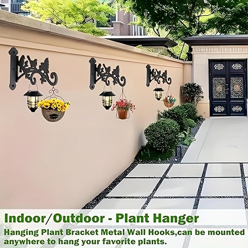 One Set2This plant hanger features black metal hooks designed to resemble three birds and a leaf Sturdy outdoor hooks are suitable for flower