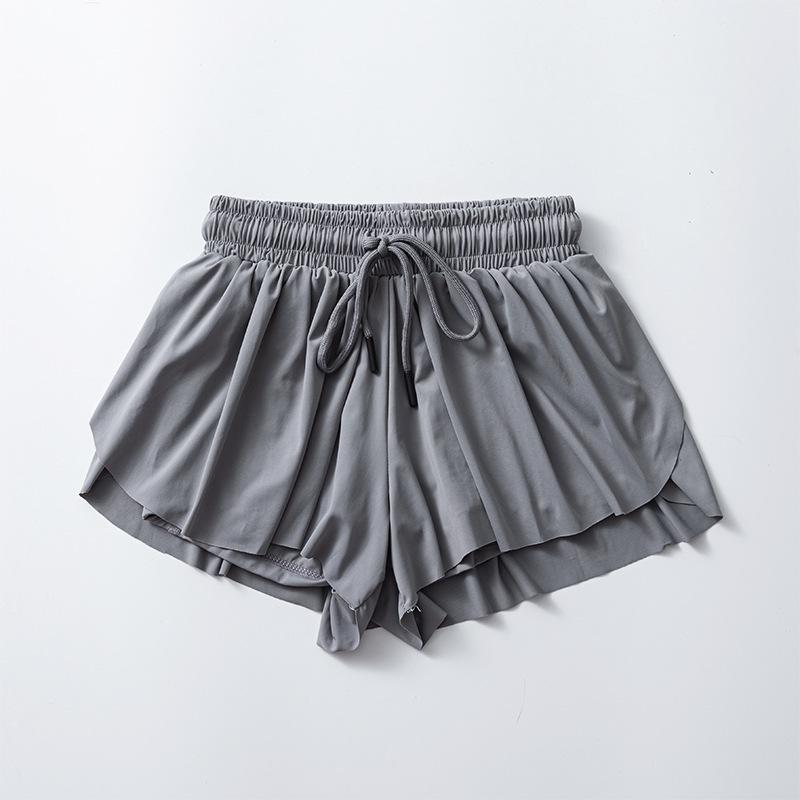 Gonna da Yoga/Tennis da Donna ad Asciugatura Rapida con Pantaloncini Traspiranti e Tasche
