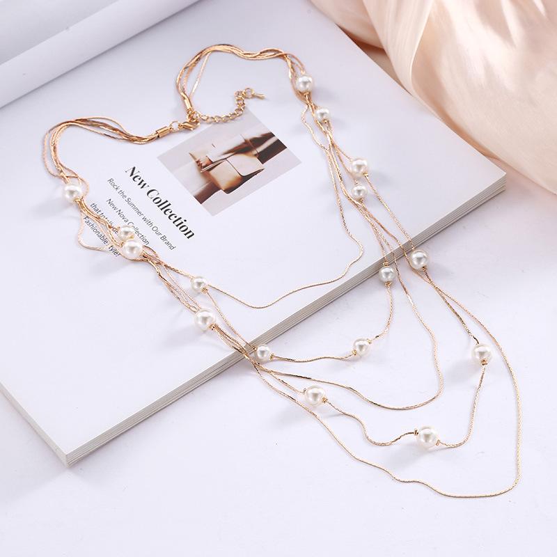 Autumn and winter simple solid color imitation pearl necklace high-end snake bone chain warm color sweater chain women's collarbone chain