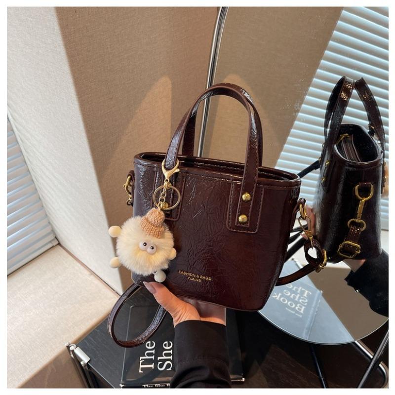 

Ручная переноска простая универсальная сумка-ведро женская новая модная модная сумка на плечо повседневная сумка-мессенджер темно-коричневого