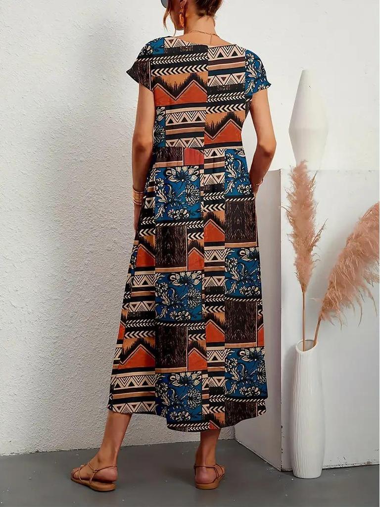 2023 Dámské evropské a americké letní šaty bez rukávů volného střihu s kulatým výstřihem a potiskem