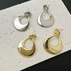 Trendy Geometric Metal Oval Ear Studs – French Luxury Hong Kong Style Earrings for Women