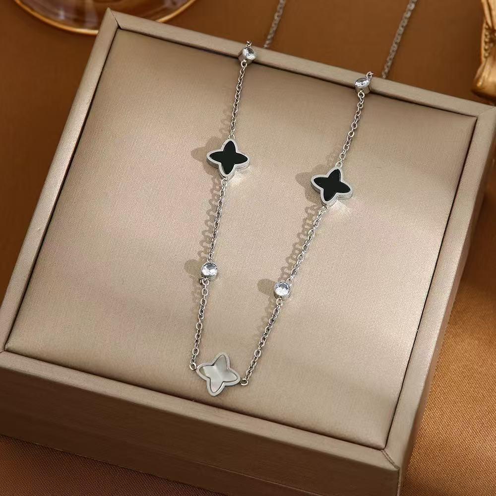 European-American Cross-Border Four-Leaf Clover Titanium Steel Necklace Pendant - High-End Design Jewelry.