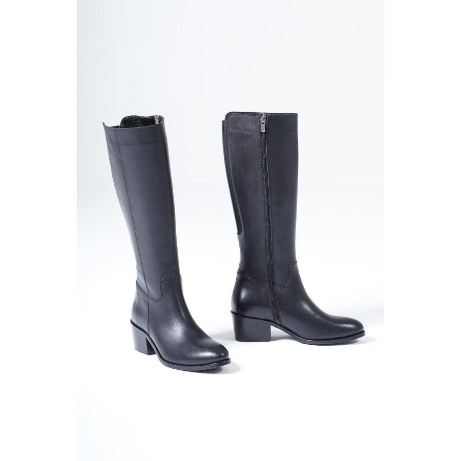 

Женские сапоги из натуральной кожи на каблуке до колен