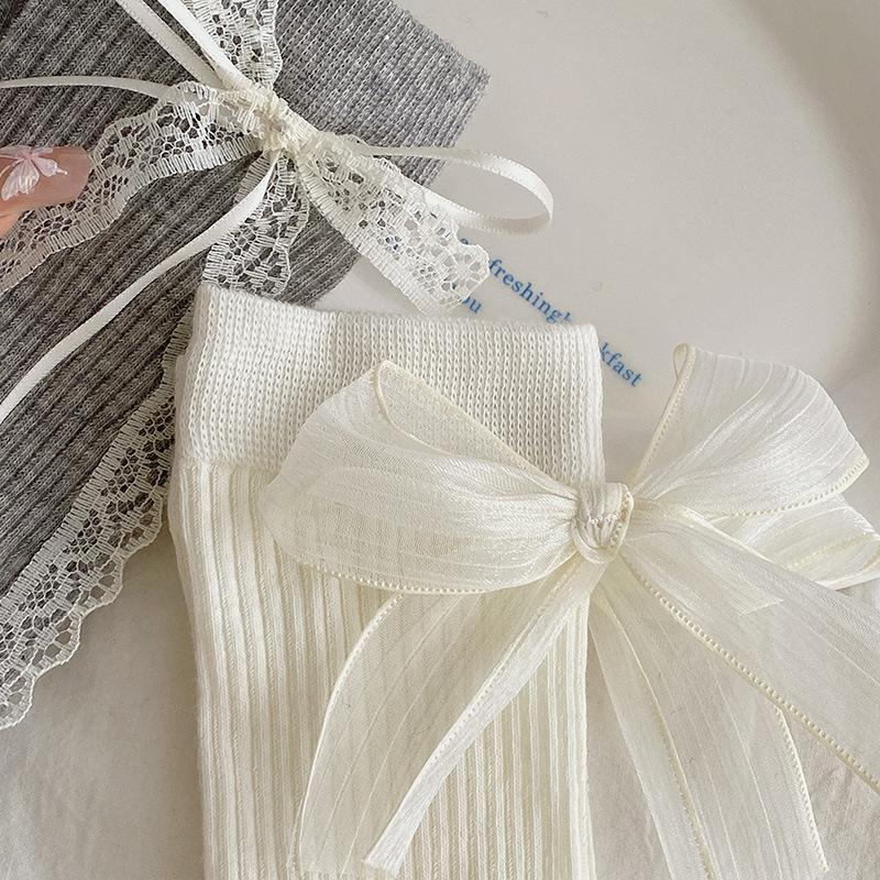 Wiosenne i letnie lekkie, jednokolorowe skarpetki Lolita do połowy łydki dla kobiet, słodkie skarpetki frotte z koronkową siateczką i kokardką