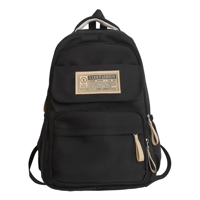 Korean version of casual style student schoolbag simple labeling large capacity junior high school student backpack
