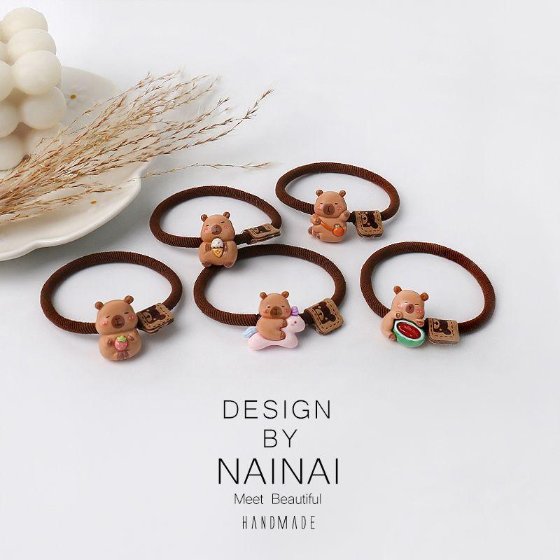 

Капабала Веревка для волос Капибара Ремешок для переноски Милая мультяшная резинка Повязка для волос Молодой взрослый Студент Сладкий завязанный пучок волос Украшения для волос Capibala hair ring five-piece set