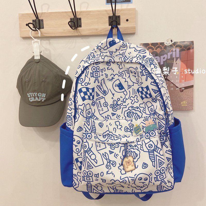 Cute graffiti personality niche schoolbag female Harajuku high school large capacity backpack college backpack