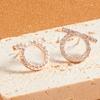 1 pair of circular heart shaped pendants with pearl ear clips