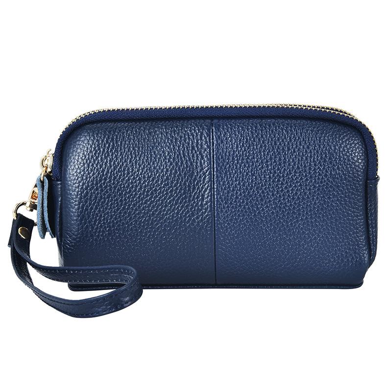 One piece is sent on behalf of the first layer of cowhide clutch bag, new trendy and fashionable women's medium mother bag wallet.