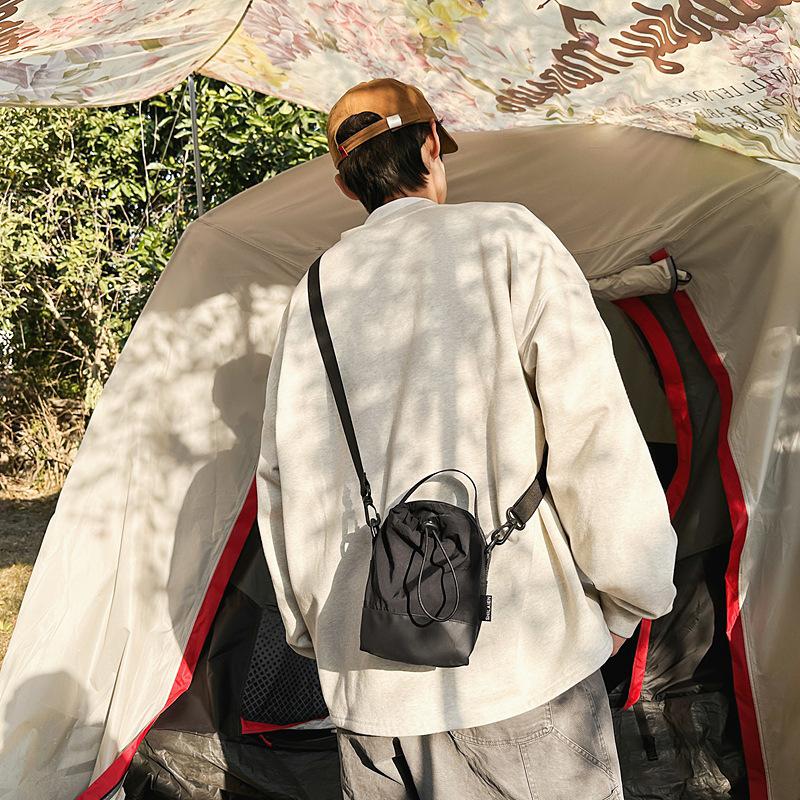 Niche sports messenger bag casual small bag street men and women simple 2025 spring trend shoulder bucket bag