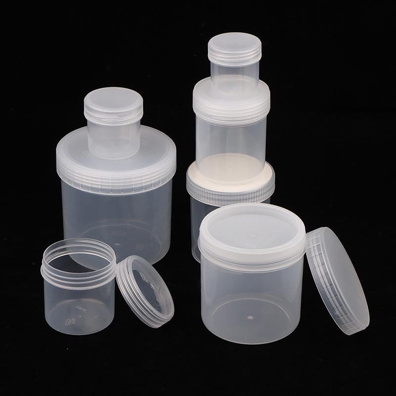 Průhledná uzavřená plechovka s víkem Plastová prázdná balící láhev Kruhové úložiště kbelík Sklenice na sušenky Potravinářské uzavřené plechovky Nádržka