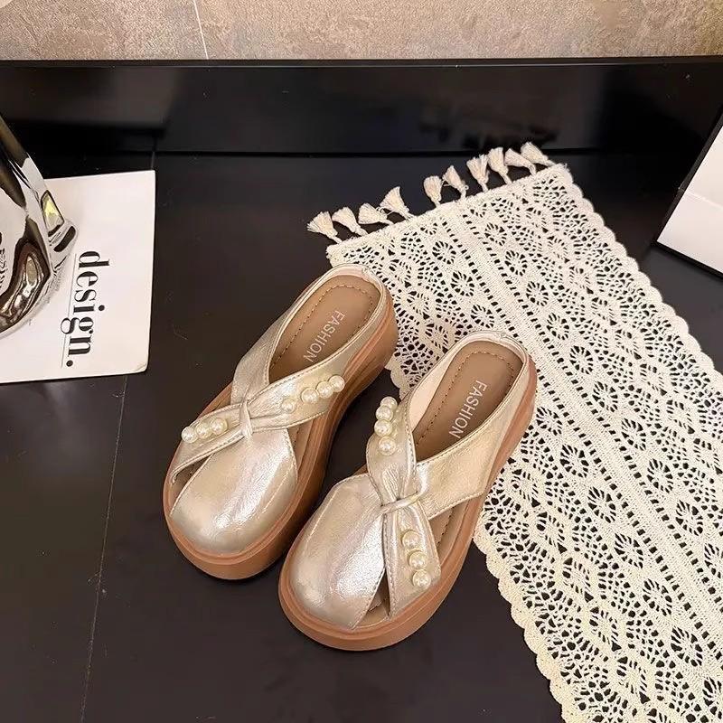 

Pearl bag head half slippers women s outer wear 2025 new summer thick sole hollow one pedal lazy half tray beach shoes 40