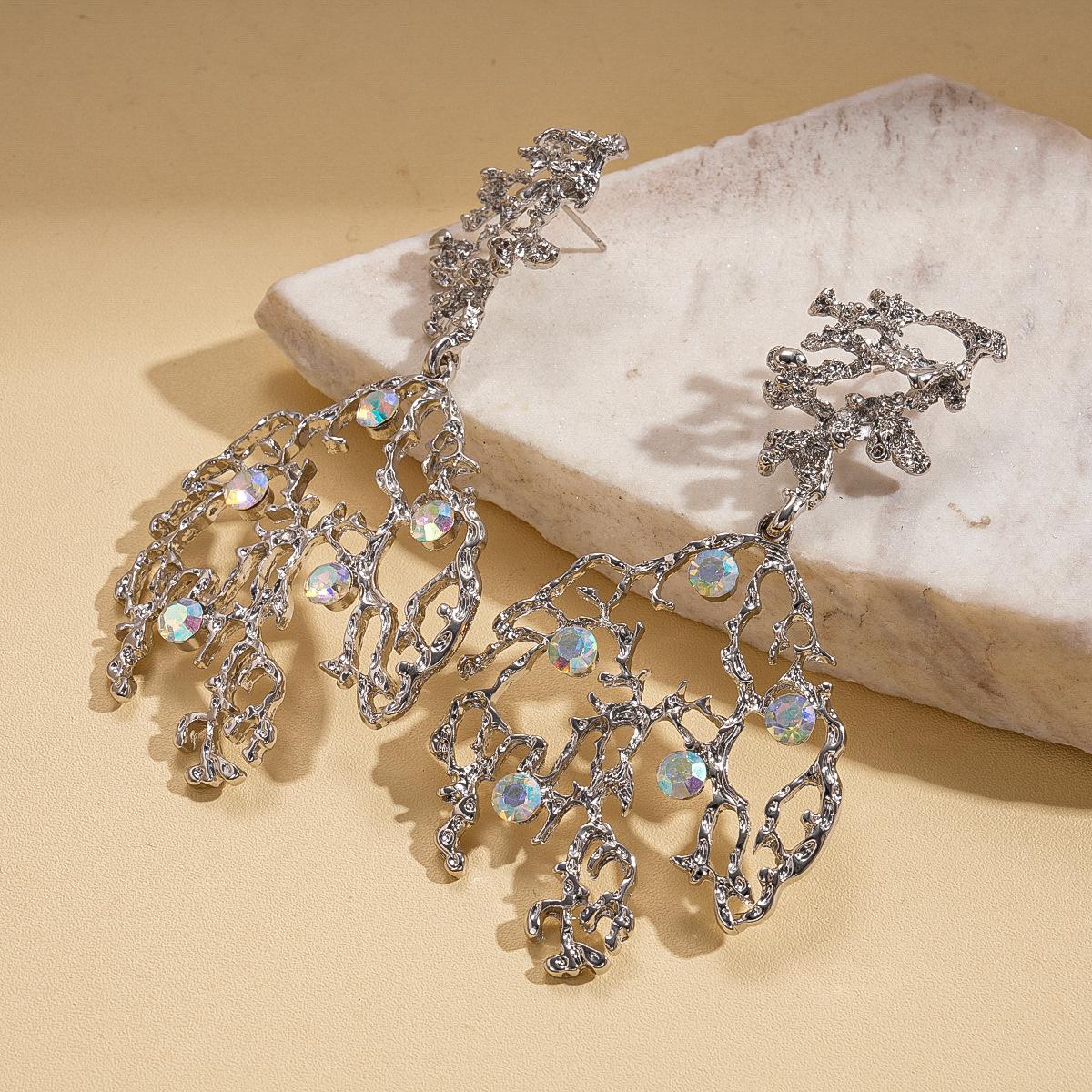 Diamond-set irregular pleated hollow leaves silver needle earrings unique niche earrings