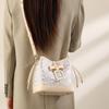 Guangxi Zhuang Brocade Heritage Women's Bow Drawstring Bag - 2026 New Chinese Style Crossbody Bucket Bag
