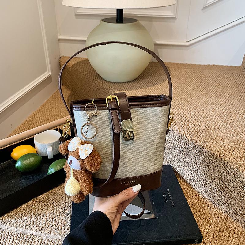Retro casual texture contrasting color bucket bag 2025 autumn and winter new fashionable versatile simple portable shoulder messenger bag