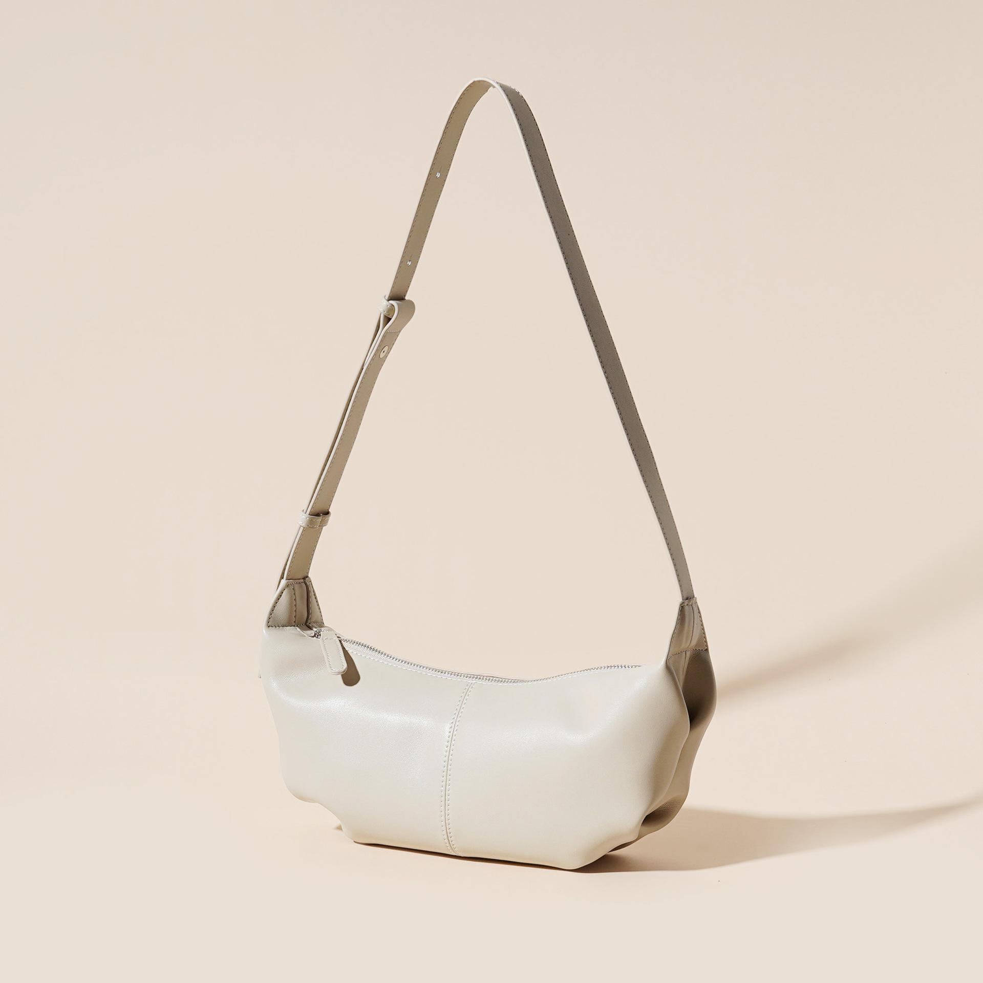 

Leather high-end casual leather cloud bag 2025 new fashion versatile shoulder bag trendy messenger stray bag 33*10*·16.5cm кремовый