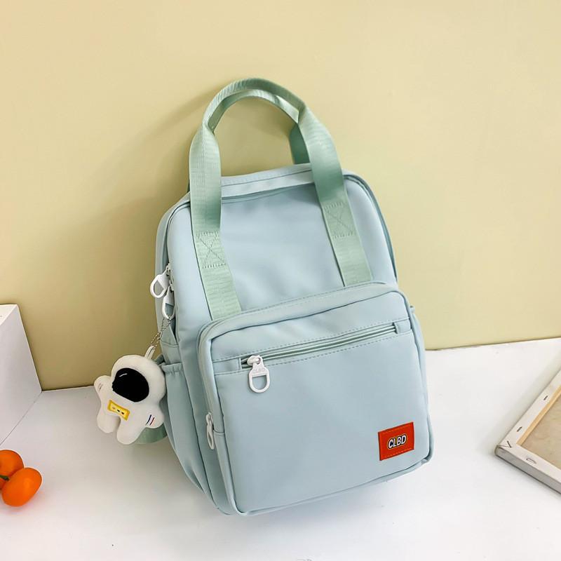 Unisex Primary School Student Backpack Waterproof Handbag With Colorful Patchwork Design