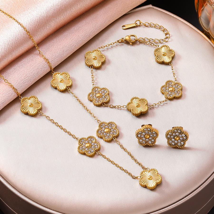 Elegant Five-Petal Rhinestone Flower Jewelry Set: 18K Gold-Plated Bracelet, Necklace & Earrings