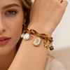 European Retro Tortoiseshell Chain Bracelet with Gold Flower and Pearl Pendant, Versatile Stainless Steel Jewelry.