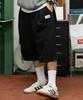 Igseukeoseu Bermuda Caesar Tuck Wide Pants Black