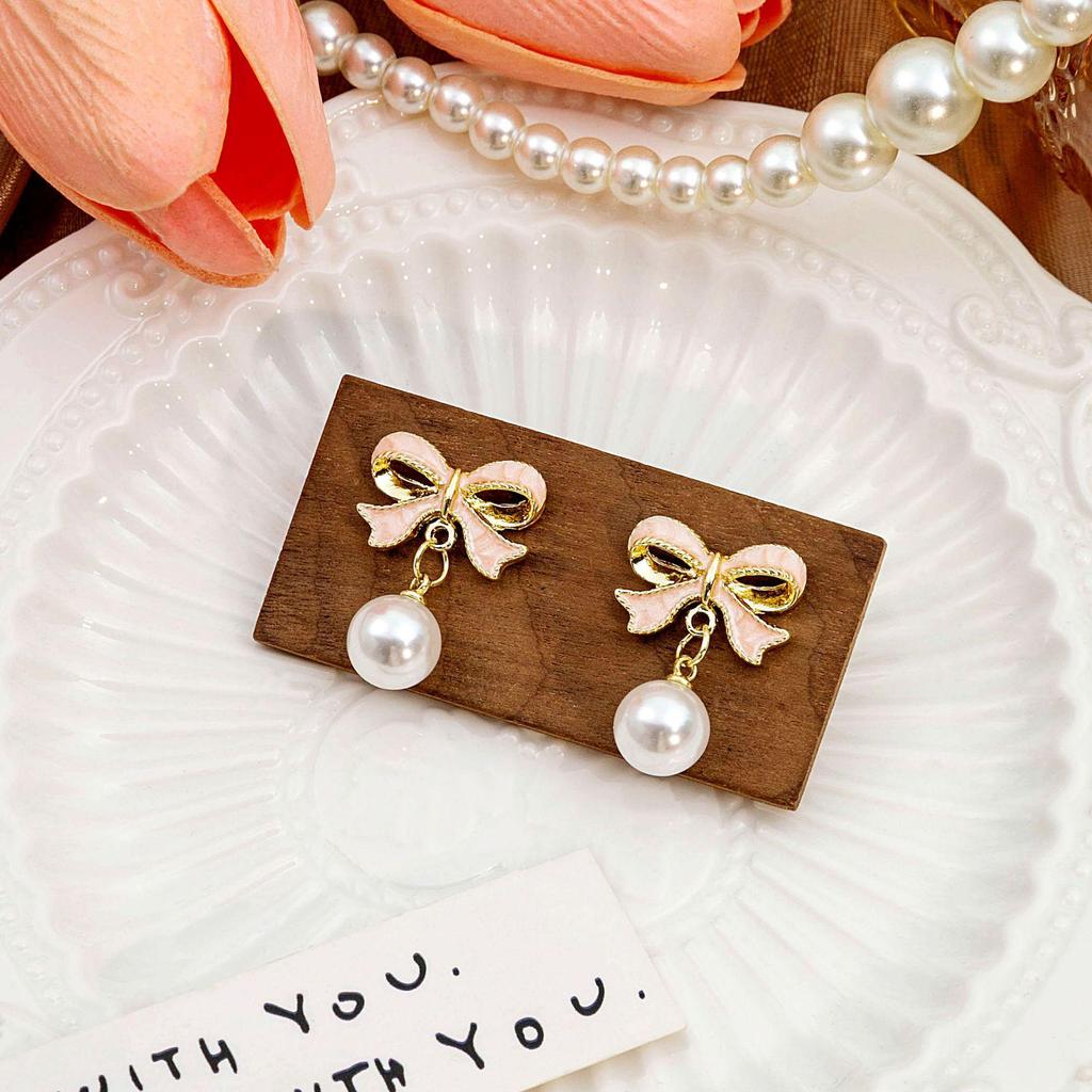 Trendy Pink Bow Pearl Clip-On Earrings - Korean Style Fashionable & Versatile New Arrival
