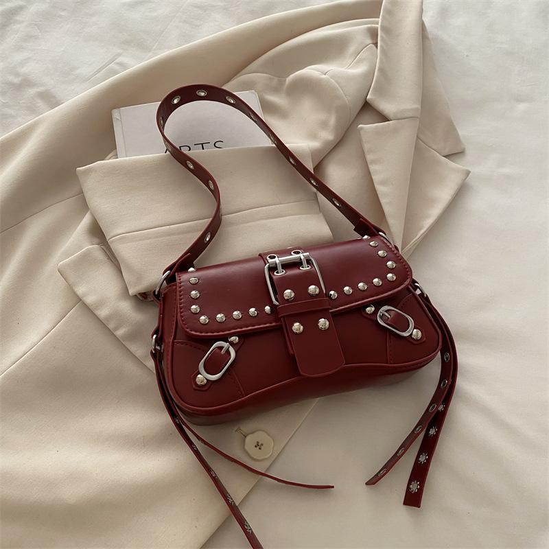 2025 New Shoulder Messenger Bag Texture Trendy Cool Spice Girl Rivet Personalized Design Locomotive Fashionable Underarm Baguette Bag