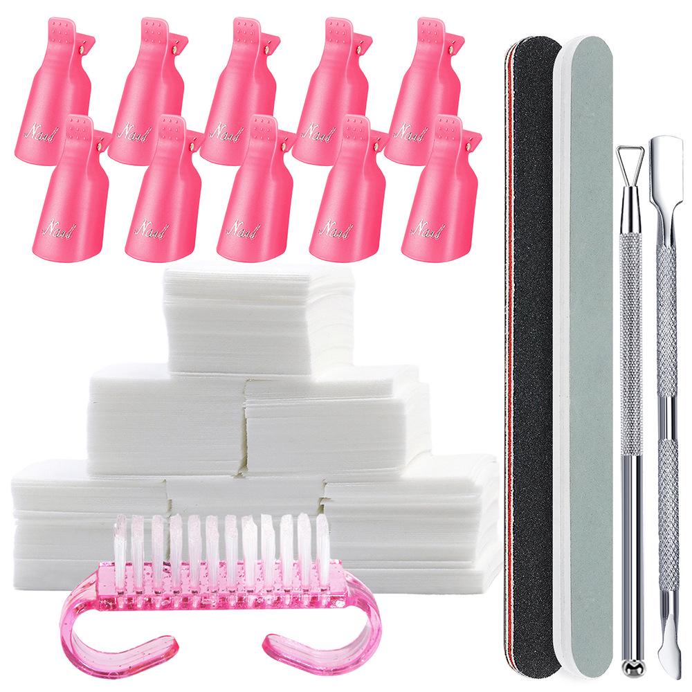

7-Piece Nail Art Tool Set: Buffing Strips, Nail Files, Cotton Pads, Remover Caps, and Stainless Steel Cuticle Pusher. 21.8x17.6 cm розовый