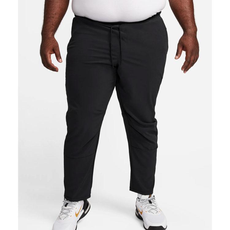 Nike Nieograniczone Spodnie dresowe Comfort Knit z haftowanym logo Męskie Spodnie Czarne FB7546-010