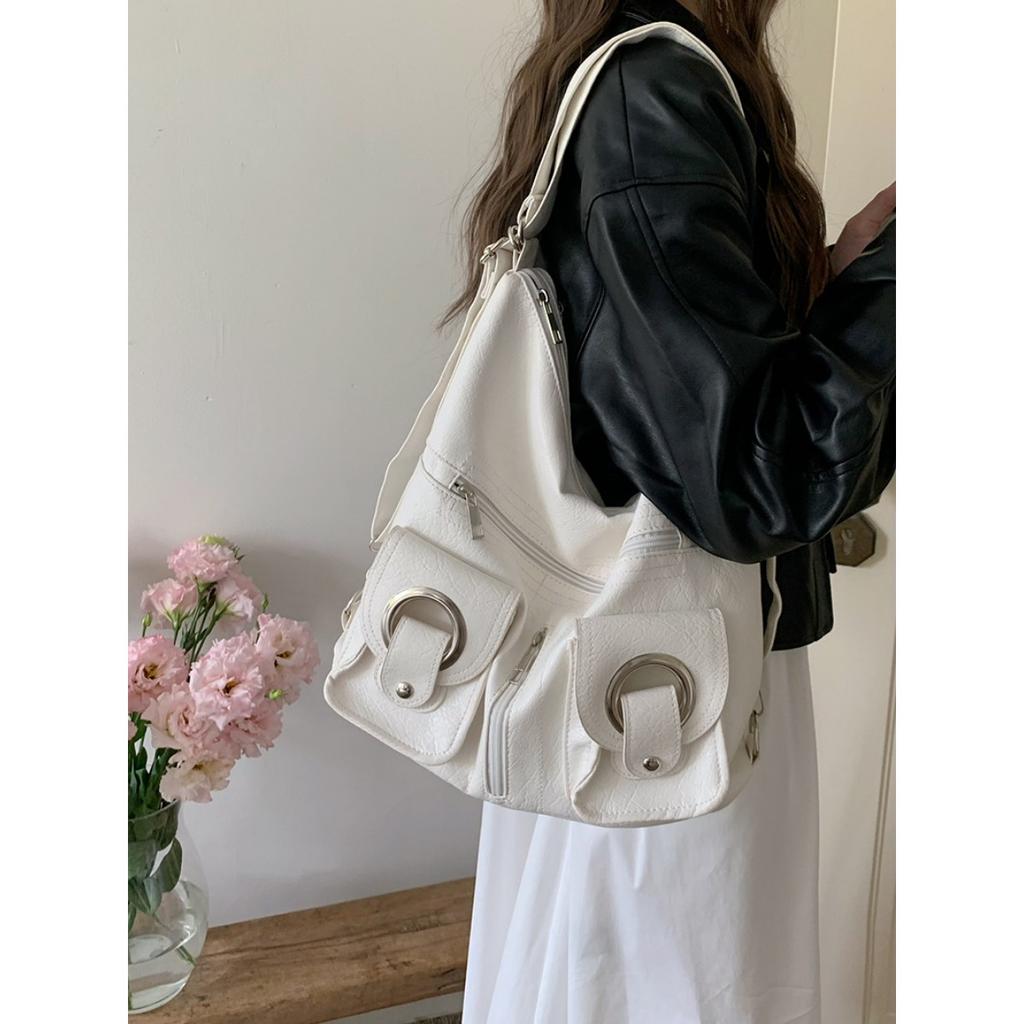 Koreanische Version Schlichte Persönlichkeit Vielseitig Modisch Reißverschlusstasche PU-Leder Tragetasche Schultertasche Pendeln Große Kapazität Rucksack