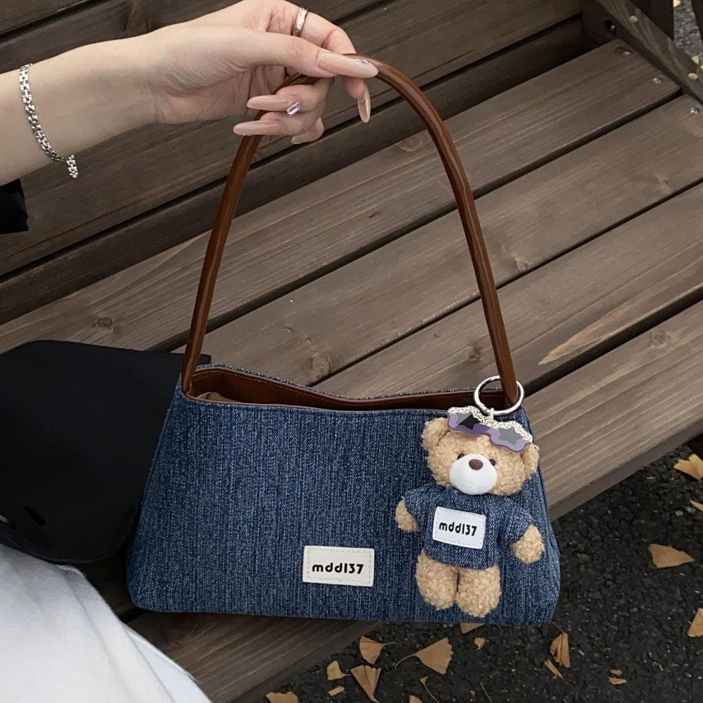 Korean version of denim hand-carried dumpling bag women 2025 new retro niche foreign style casual single shoulder underarm commuter bag