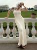 Solid color knitted suspender dress European and American summer new slim lazy casual off-the-shoulder suspender long