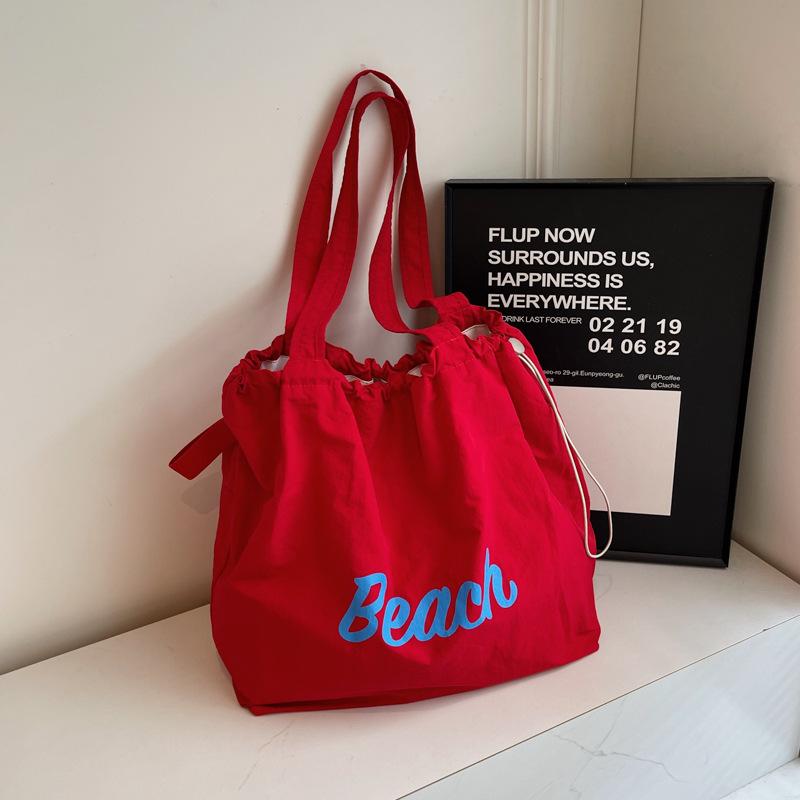 

Корейская версия новой сумки с принтом букв, женская холщовая сумка через плечо большой вместимости, повседневная простая портативная сумка-тоут на шнурке Small бордовый